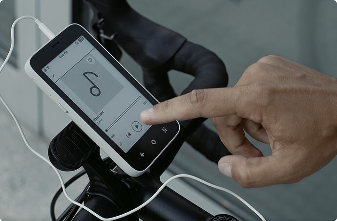 Mudita Kompakt Music Player in use